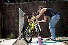 Valentina Macheda giving her bike some pre-pracitce prep.